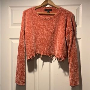 Forever 21 pink distressed crop sweater.